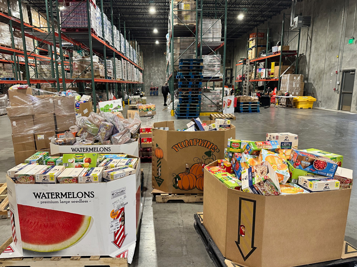 Book Systems food drive community involvement